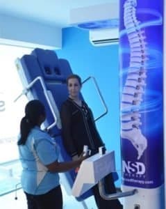 women getting spinal decompression therapy via the RxDecom
