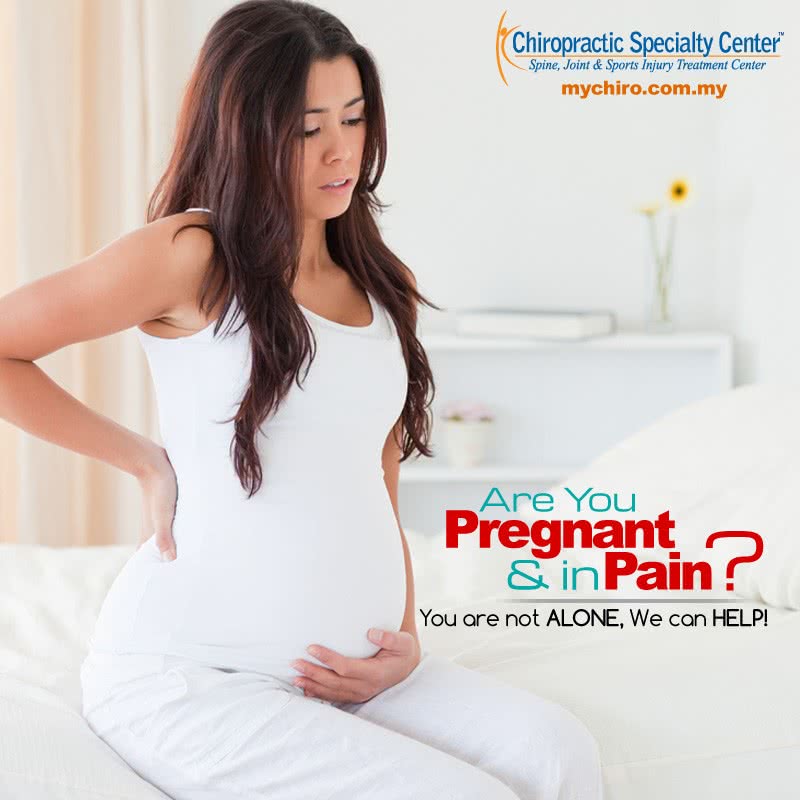 lady with back pain during pregnancy