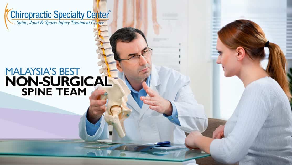 chiropractic consultation with female patient in Kuala Lumpur