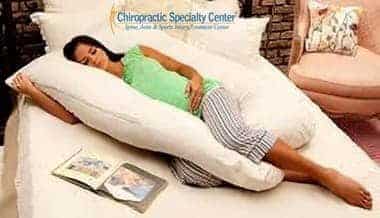 proper sleeping posture demonstrated for back pain and pregnancy