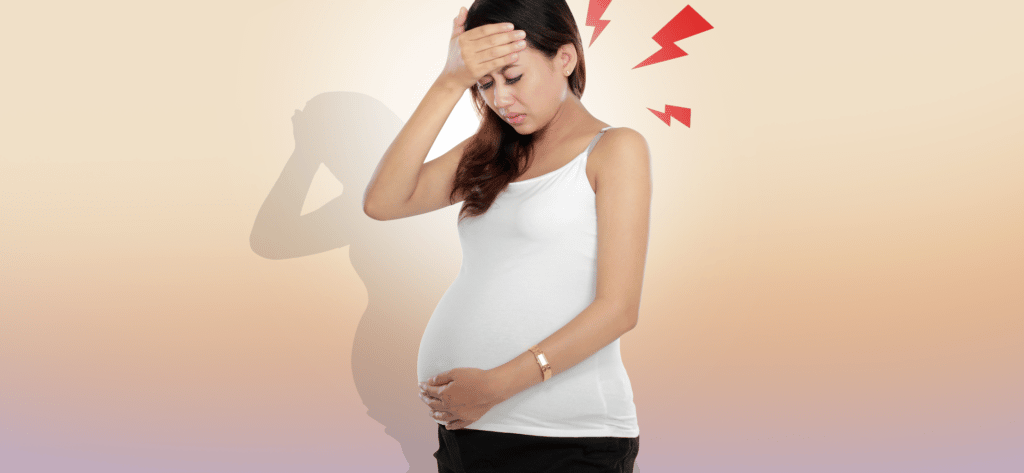Pregnancy headache, showing pregnant women touching her forehead