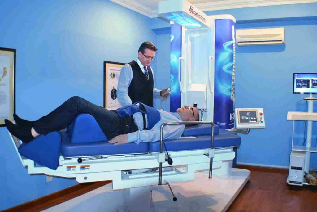 Chiropractor treating slipped disc in KL